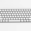 Sleek Modern Computer Keyboard With White Keys And Black Frame Design
